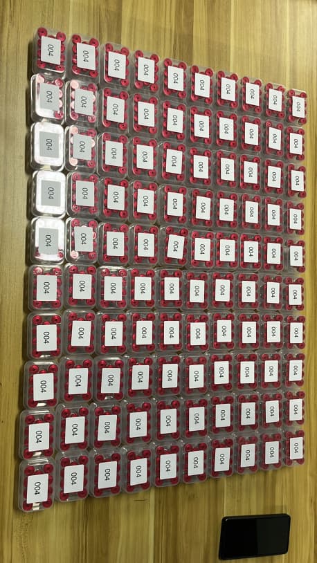 Warehouse shelving with organised research stock ready for dispatch